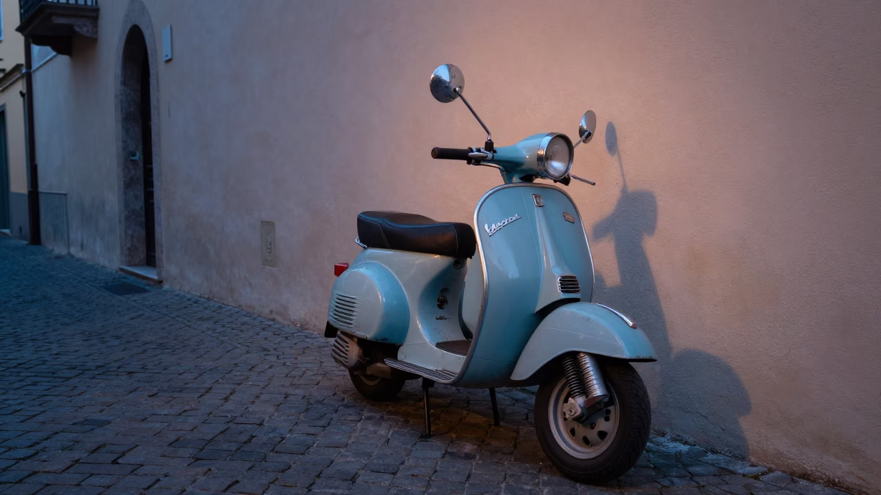 Vintage Vespa Parked on Cobblestone Lane Before Sunrise in Naples Italy in in Naples, Italy