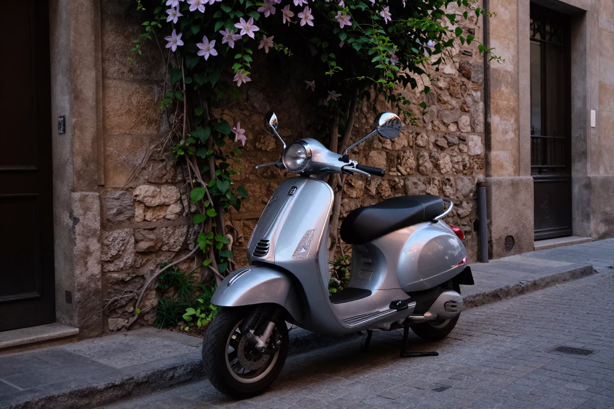 Vintage Vespa Parked on Cobblestone Lane in Barcelona Early Evening in in Barcelona, Spain