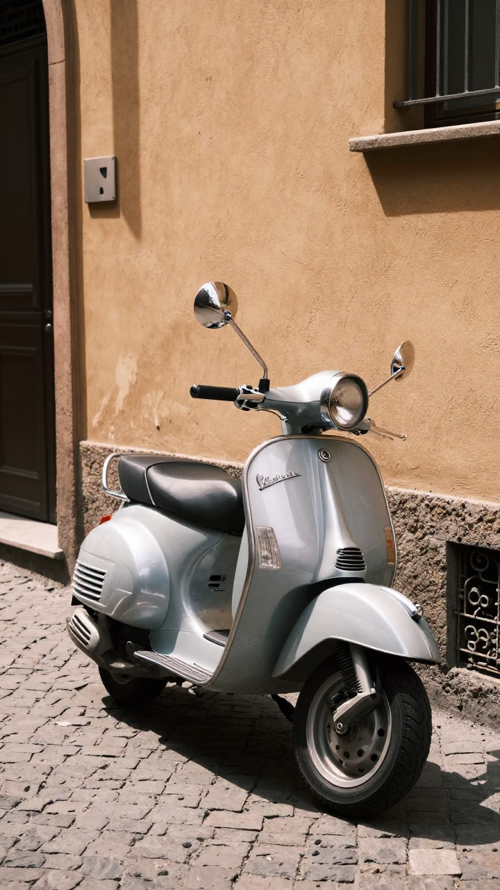 Vintage Vespa Parked on Cobblestone Lane in Bologna Italy at Midday in in Bologna, Italy