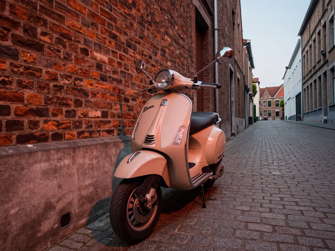 Vintage Vespa Parked on Cobblestone Lane in Brussels Belgium Before Dusk in in Brussels, Belgium