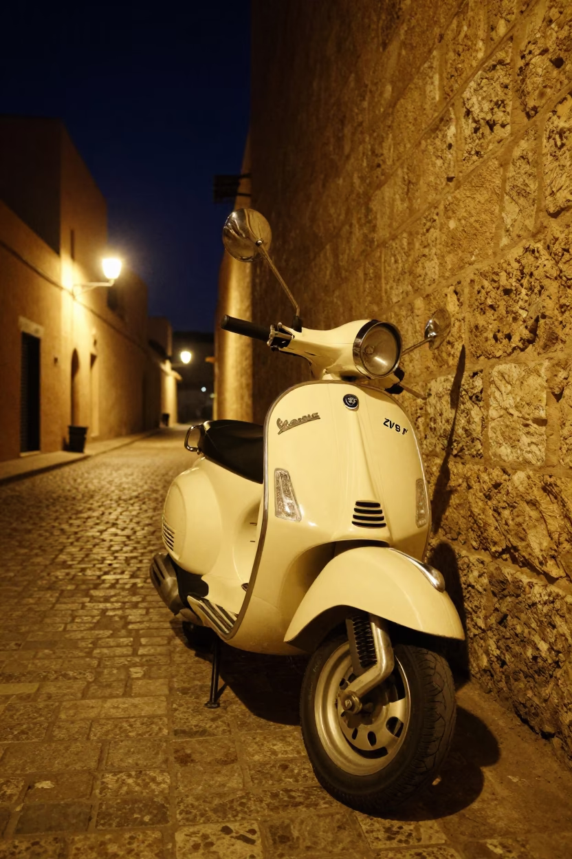 Vintage Vespa Parked on Cobblestone Lane in Casablanca at Night in in Casablanca, Morocco