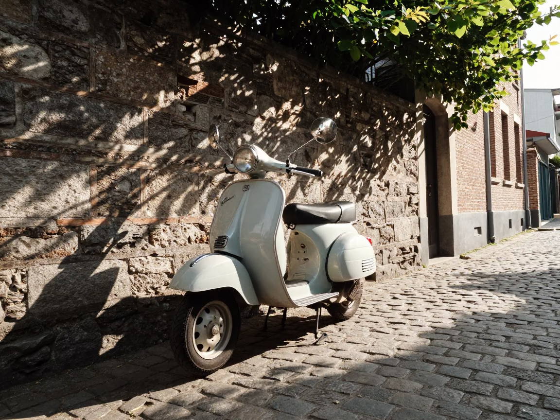 Vintage Vespa Parked on Cobblestone Lane in Early Afternoon Brussels Belgium in in Brussels, Belgium