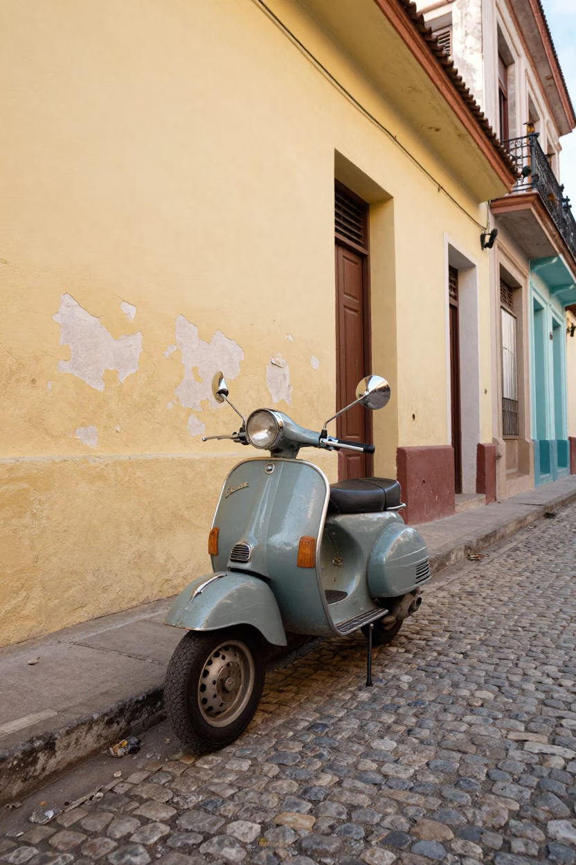 Vintage Vespa Parked on Cobblestone Lane in Early Afternoon Havana Cuba in in Havana, Cuba