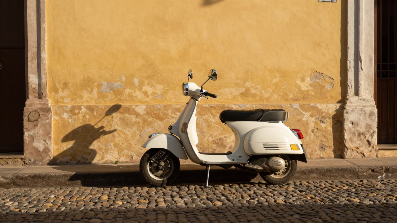 Vintage Vespa Parked on Cobblestone Lane in Havana Cuba During Late Afternoon Light in in Havana, Cuba