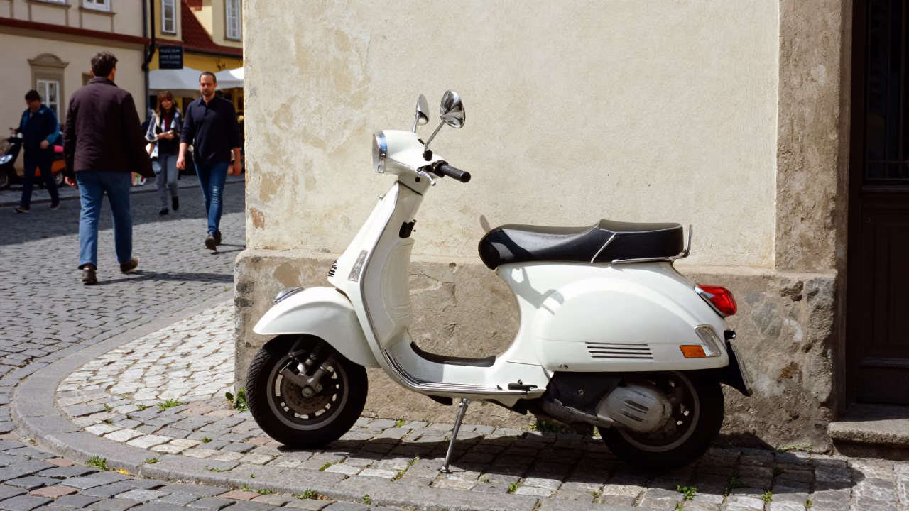 Vintage Vespa Parked on Cobblestone Lane in Prague Czech Republic Midmorning Light in in Prague, Czech Republic
