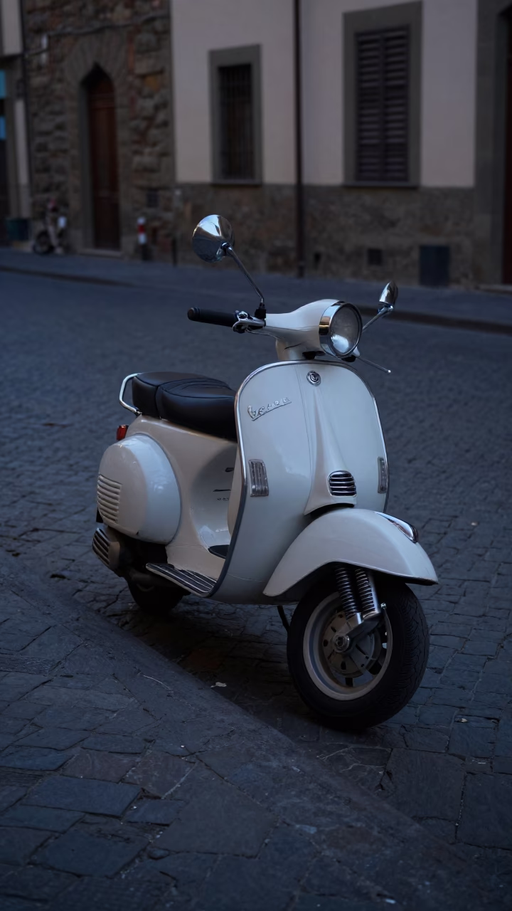 Vintage Vespa Parked on Cobblestone Lane in Pre-Dawn Florence Italy in in Florence, Italy