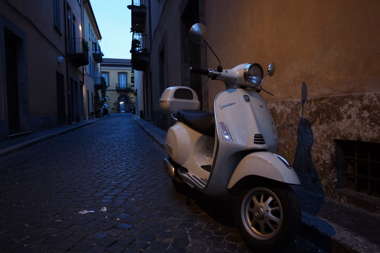 Vintage Vespa Parked on Cobblestone Lane in Predawn Naples Italy in in Naples, Italy