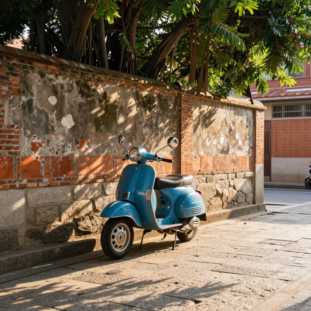 Vintage Vespa Parked on Cobblestone Lane in Tainan Late Morning Street Scene in in Tainan, Taiwan