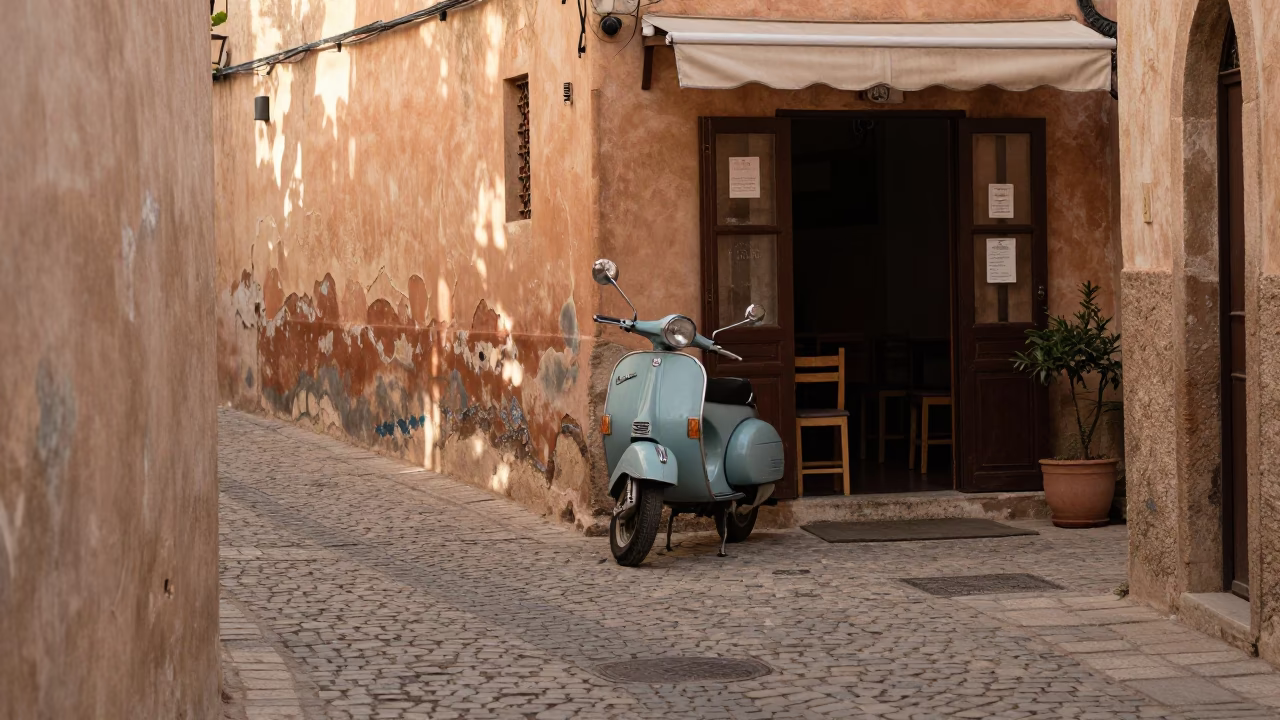 Vintage Vespa Parked On Cobblestone Lane In Tunis Tunisia At First Light in in Tunis, Tunisia