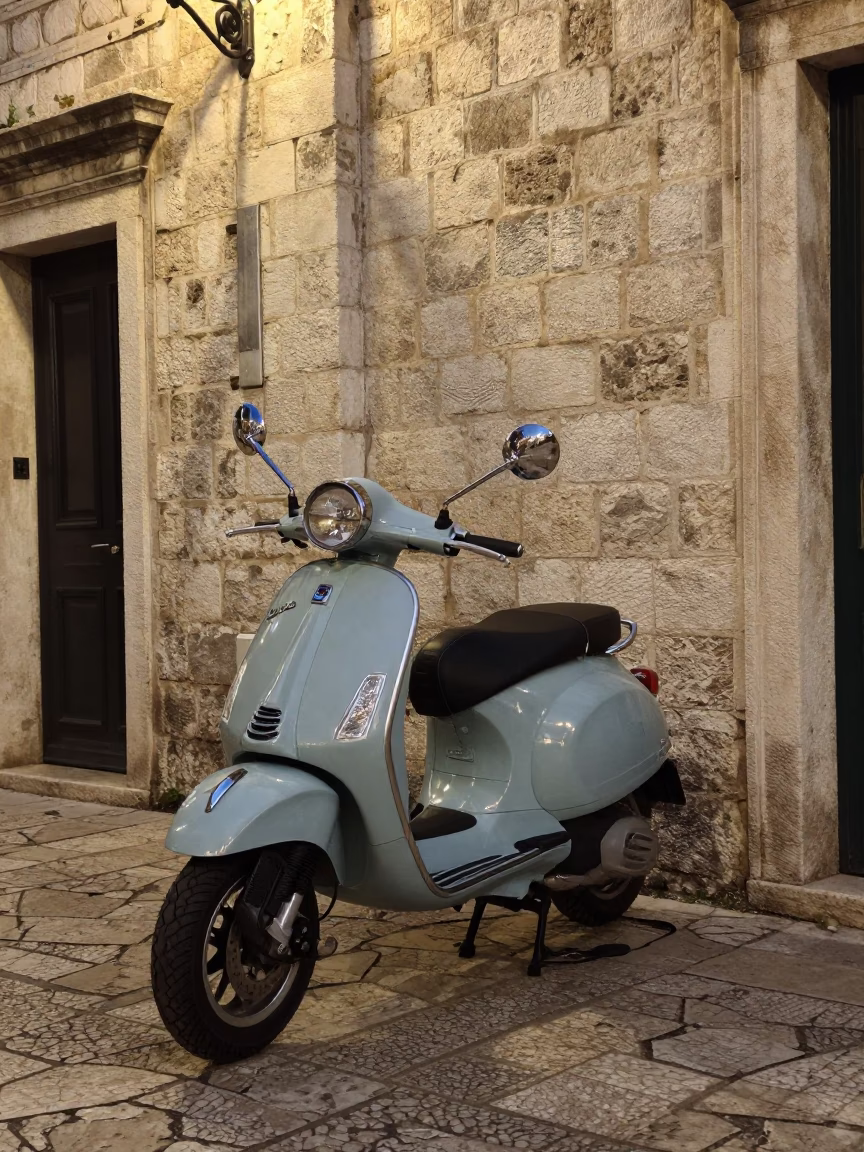 Vintage Vespa Parked on Dubrovnik Cobblestone Lane at Midnight in in Dubrovnik, Croatia