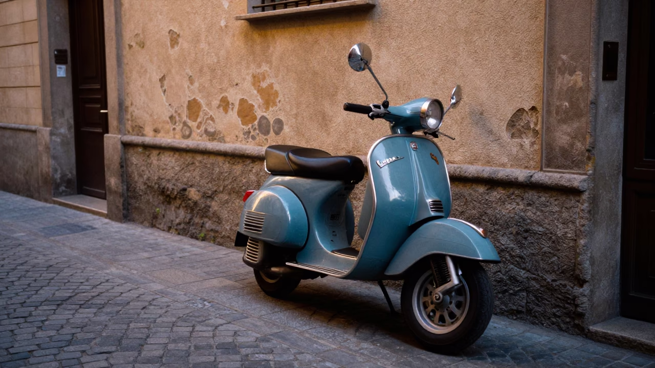 Vintage Vespa parked on narrow cobblestone lane in Barcelona Spain before dawn in in Barcelona, Spain