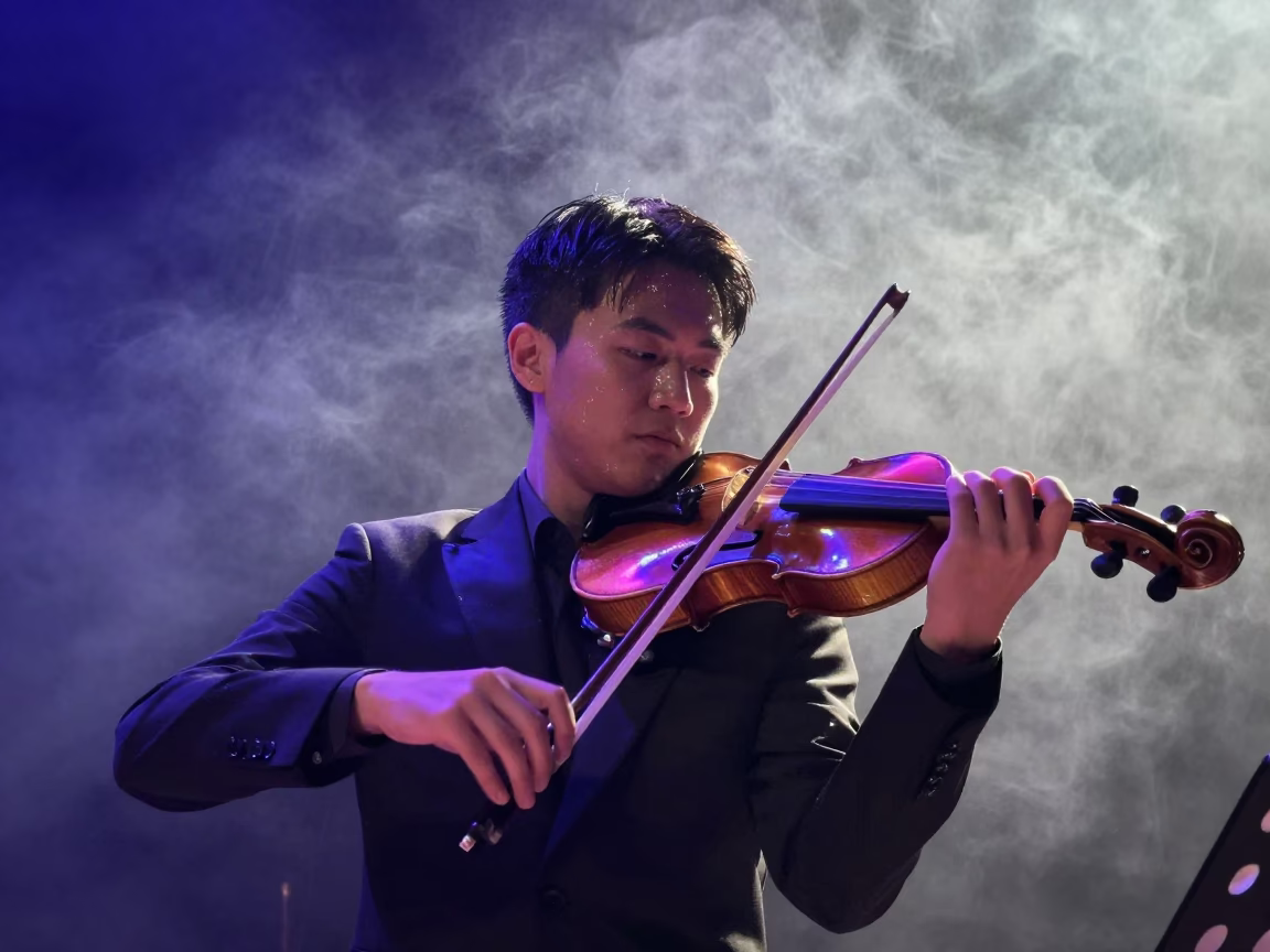 Violinist in Neon Light Before Dawn in on a theater stage in Bnei Brak