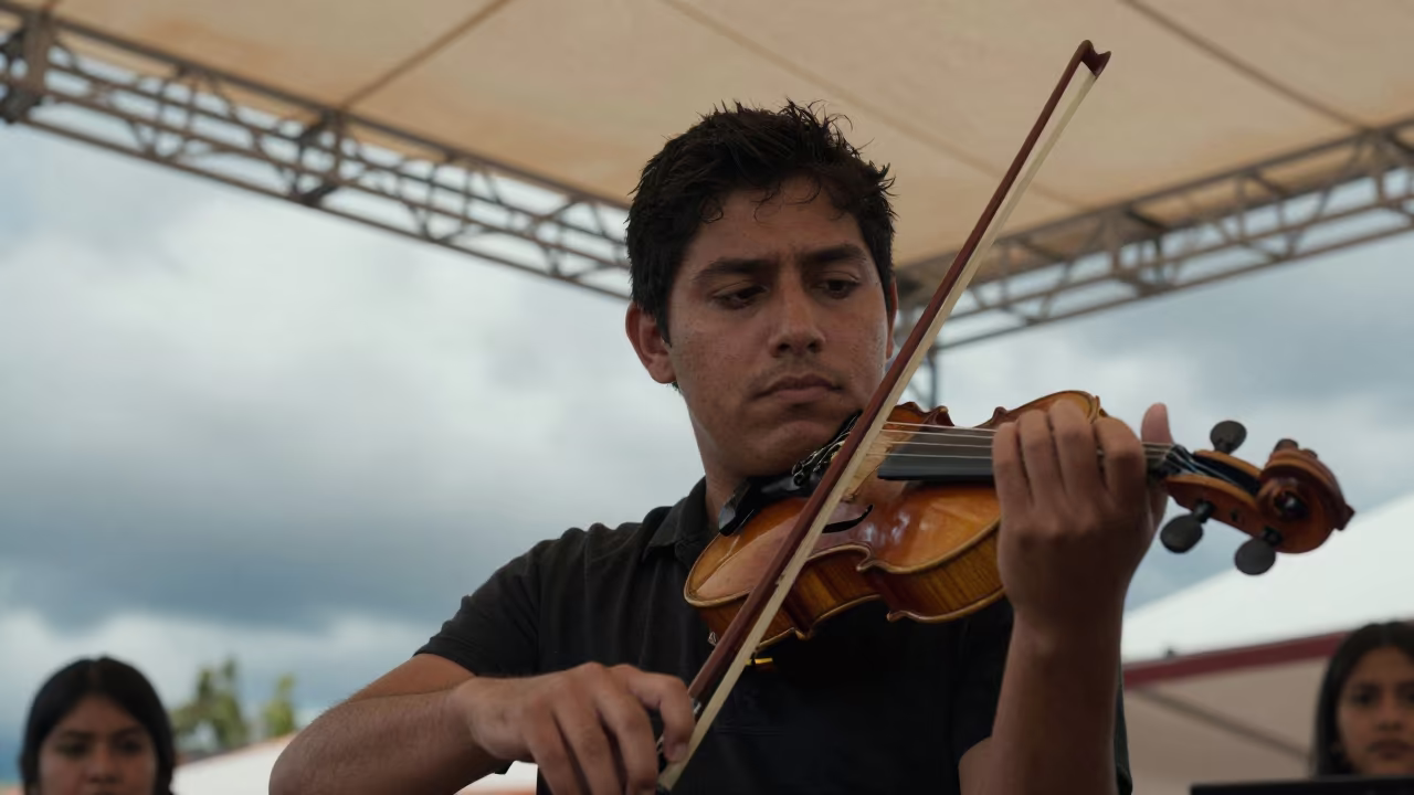 Violinist Performing in Huánuco Theater in on a theater stage in Huánuco