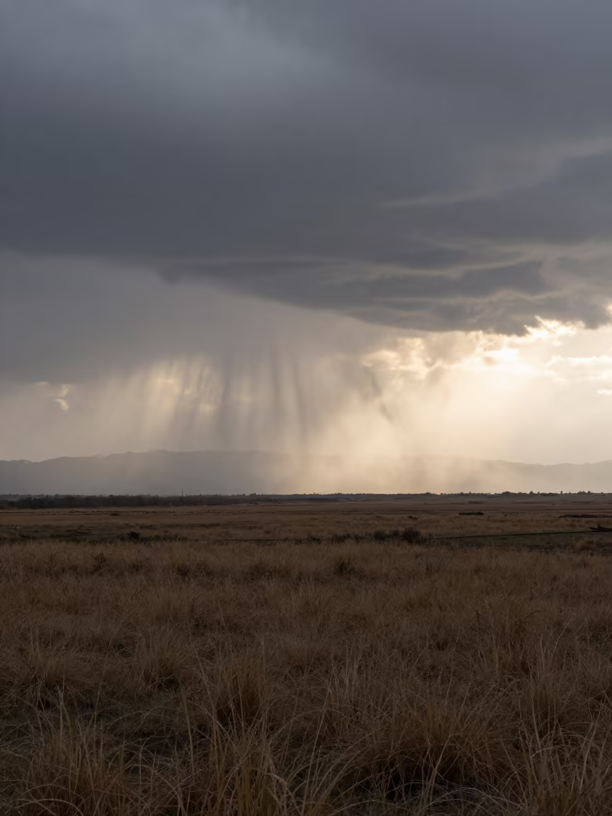 Virga Rain Streaks Over Taiwan Plain in across a storm-bright plain in Taiwan