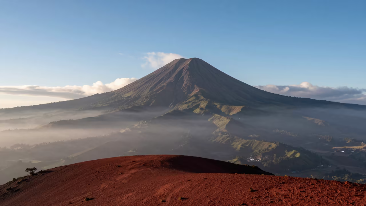 Volcanic Cone Over Quito Foothills Misty Dawn in from a ridge above layered foothills near San Marcos, Quito