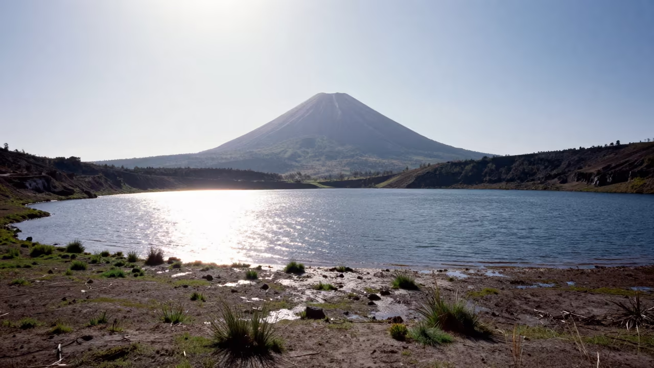 Volcanic Cone Reflection in Floodplain Crater Lake in across a floodplain after rain near Sopocachi, La Paz