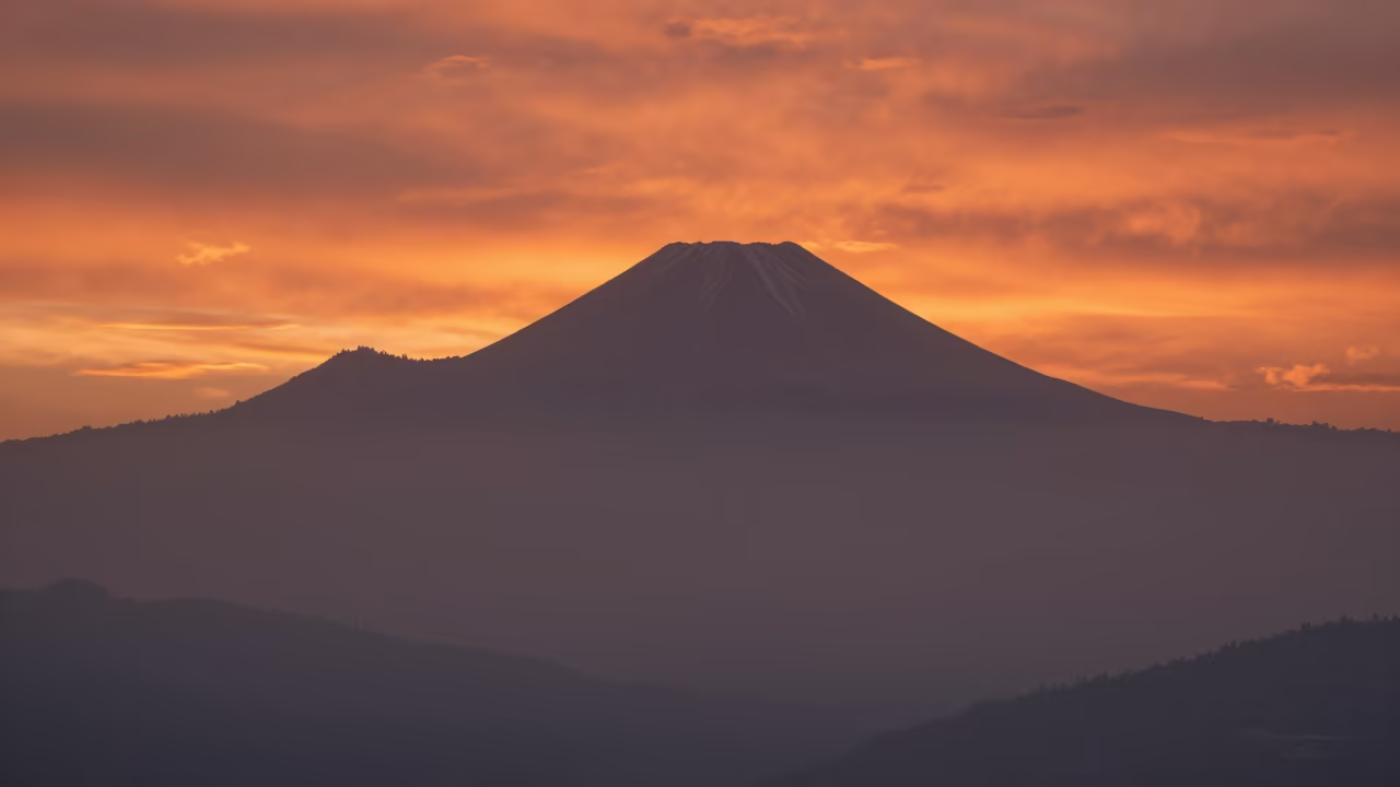 Volcanic Sunset Through Autumn Marine Fog in through low marine fog near Kathmandu