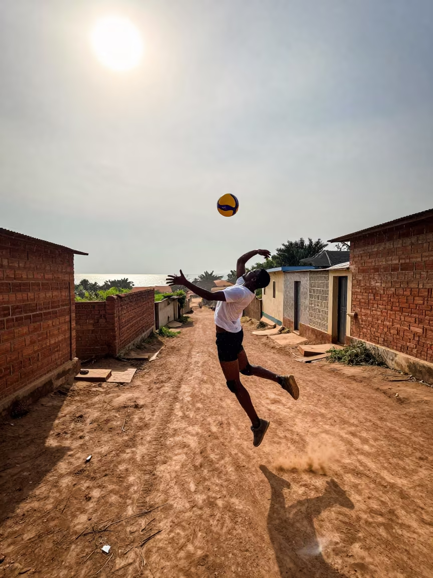 Volleyball Libero Dives on Village Lane in in a village lane near Ile Ife