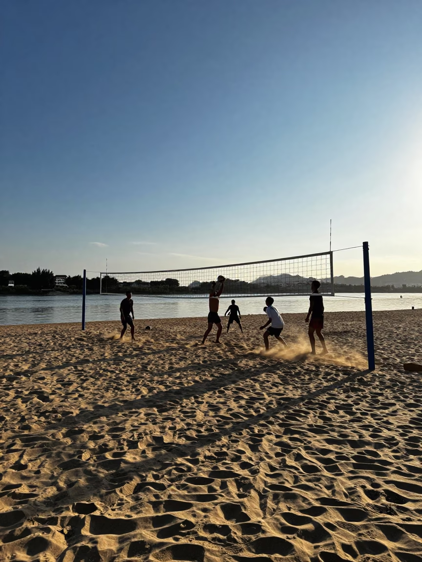 Volleyball Net Over Hot Sand Riverbank Evening in by a riverbank near Xiamen