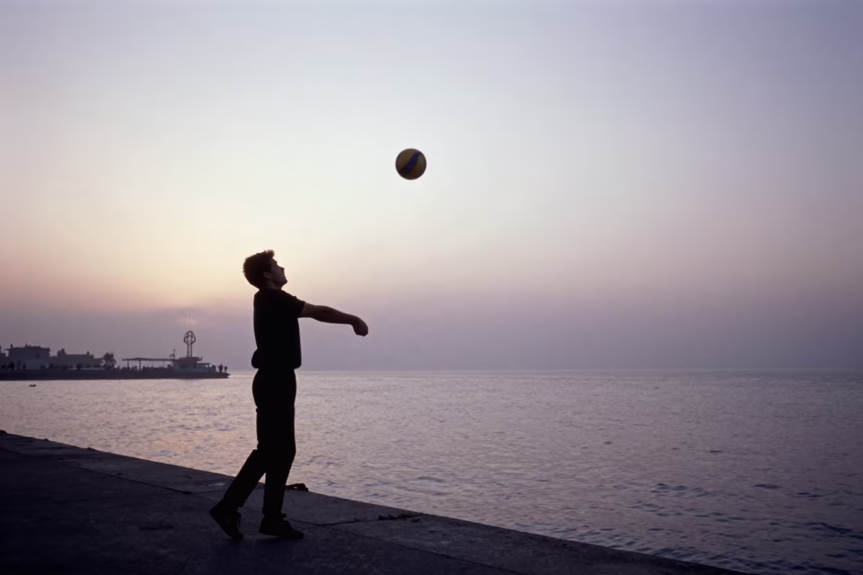 Volleyball Player Silhouette on Mashhad Harbor Quay in at a harbor quay near Mashhad