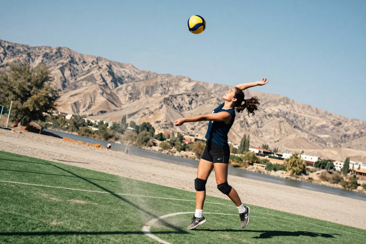 Volleyball Setter Floating Ball Midday Riverbank in by a riverbank near Sanaa
