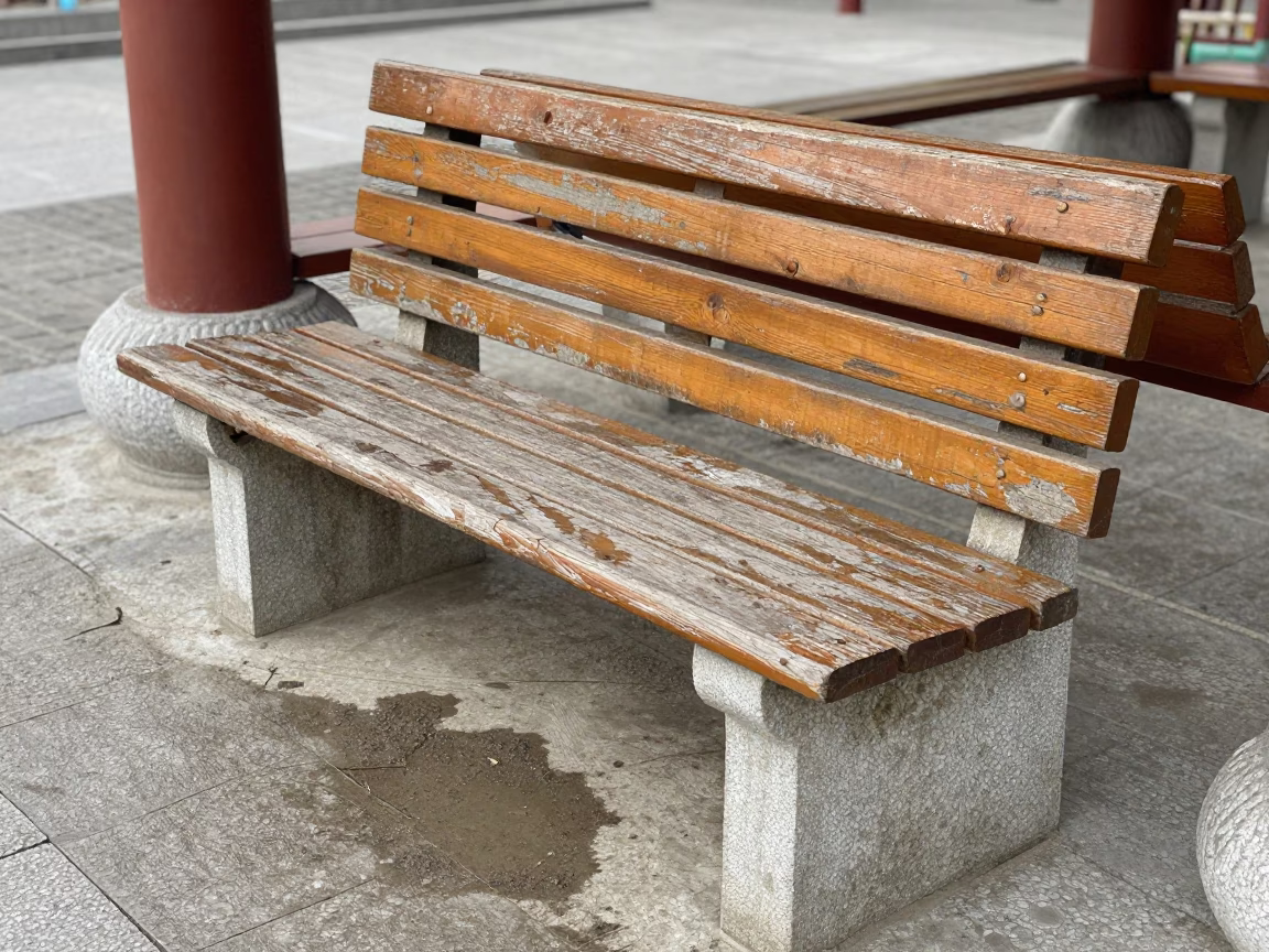 Weathered Wooden Park Bench in Beijing in in Beijing, China