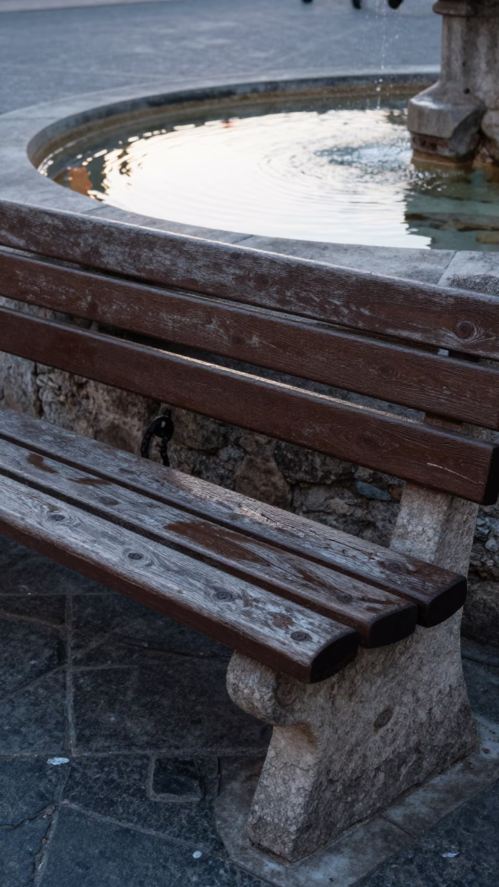 Weathered Wooden Park Bench in Granada in in Granada, Spain