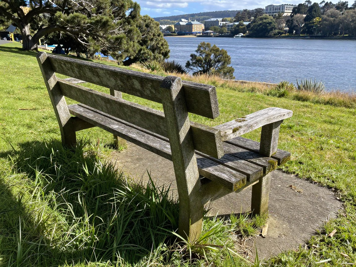 Weathered Wooden Park Bench in Hobart in in Hobart, Australia
