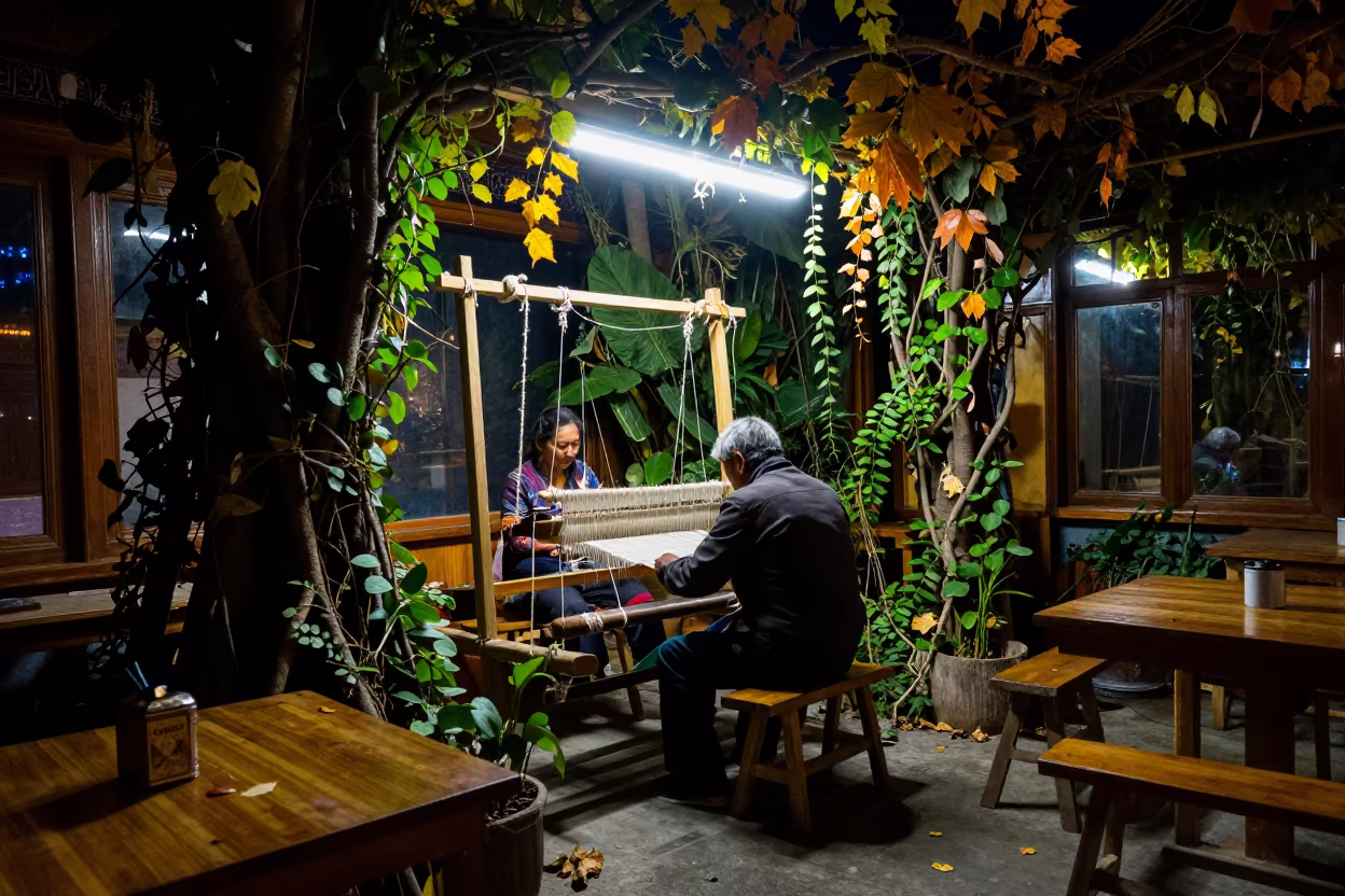 Weaver at Loom Amid Jungle Vines in Lhasa Cafe in in a cafe in Norbulingka, Lhasa
