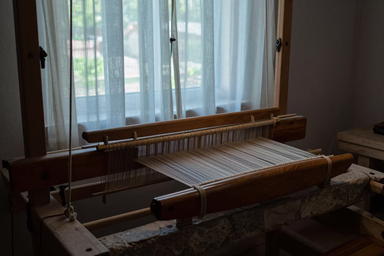Weaver Shuttle on Stone Loom in Dawn Light Kayseri in on a stone ledge in Kayseri