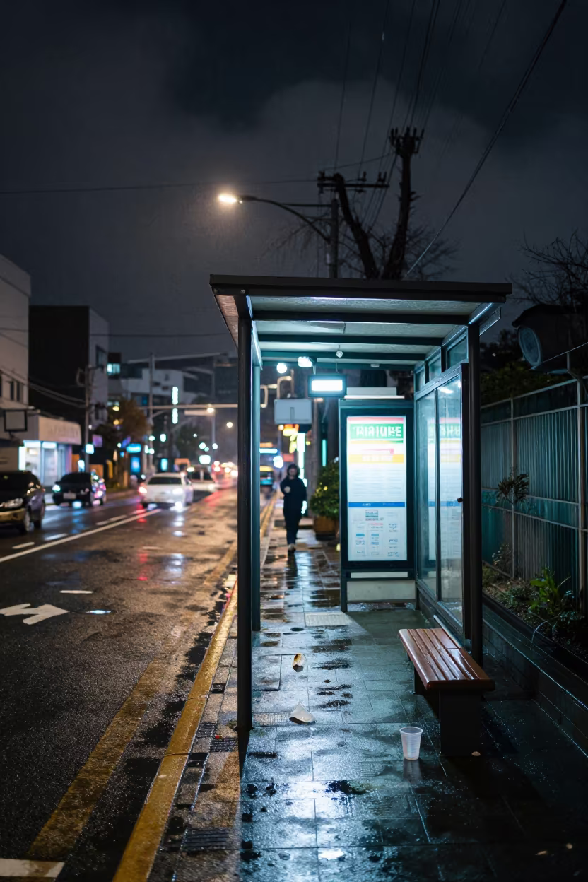 Wet Bus Stop Night Incheon Store Glow in outside a fluorescent convenience store in Incheon