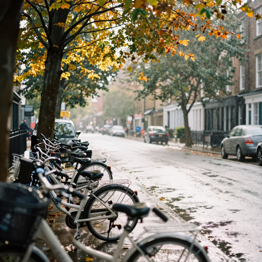 Wet Pavement Reflecting Parked Bicycles in Autumn in along a market-lined side street in Bradford