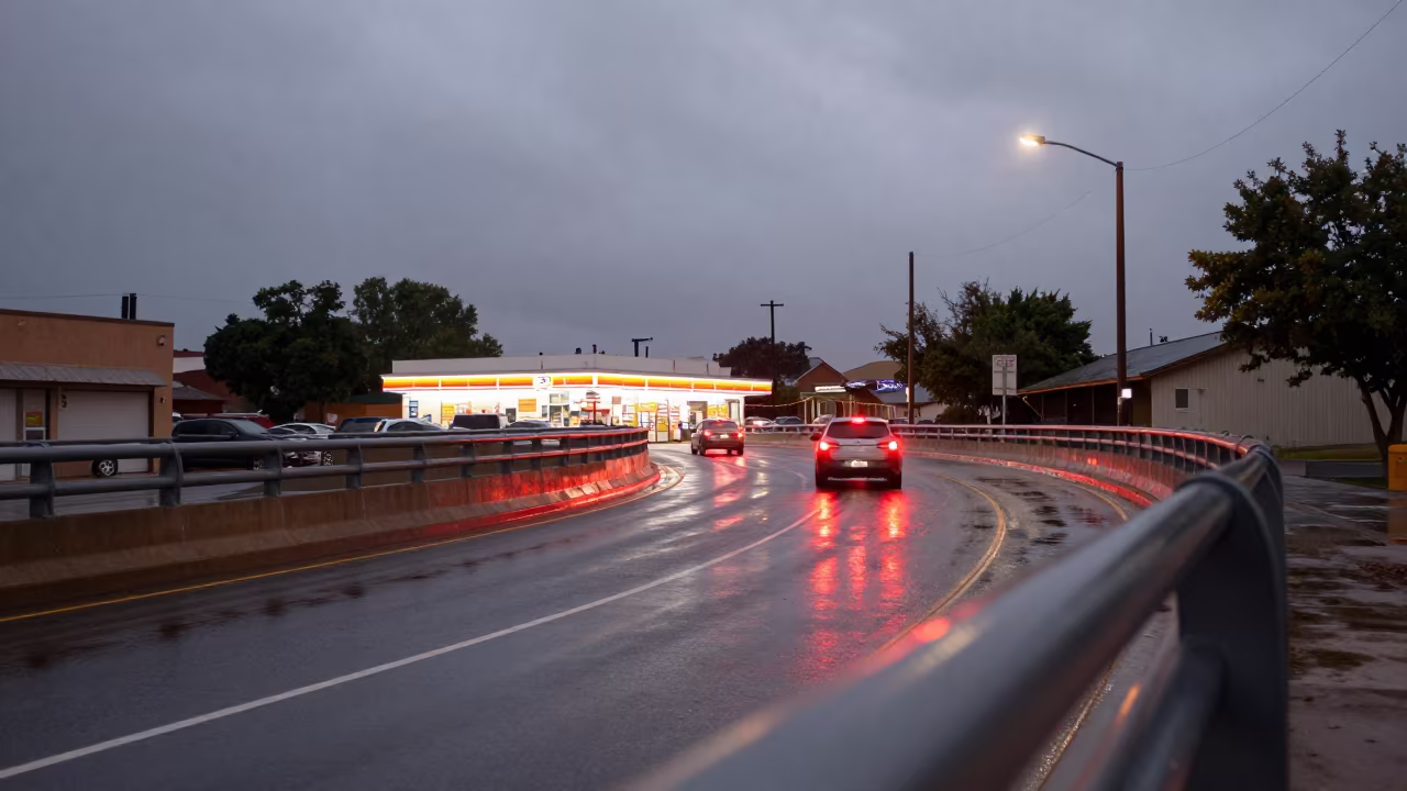 Wet Ramp Reflects Brake Lights Copper Dusk Albuquerque in outside a fluorescent convenience store in Albuquerque