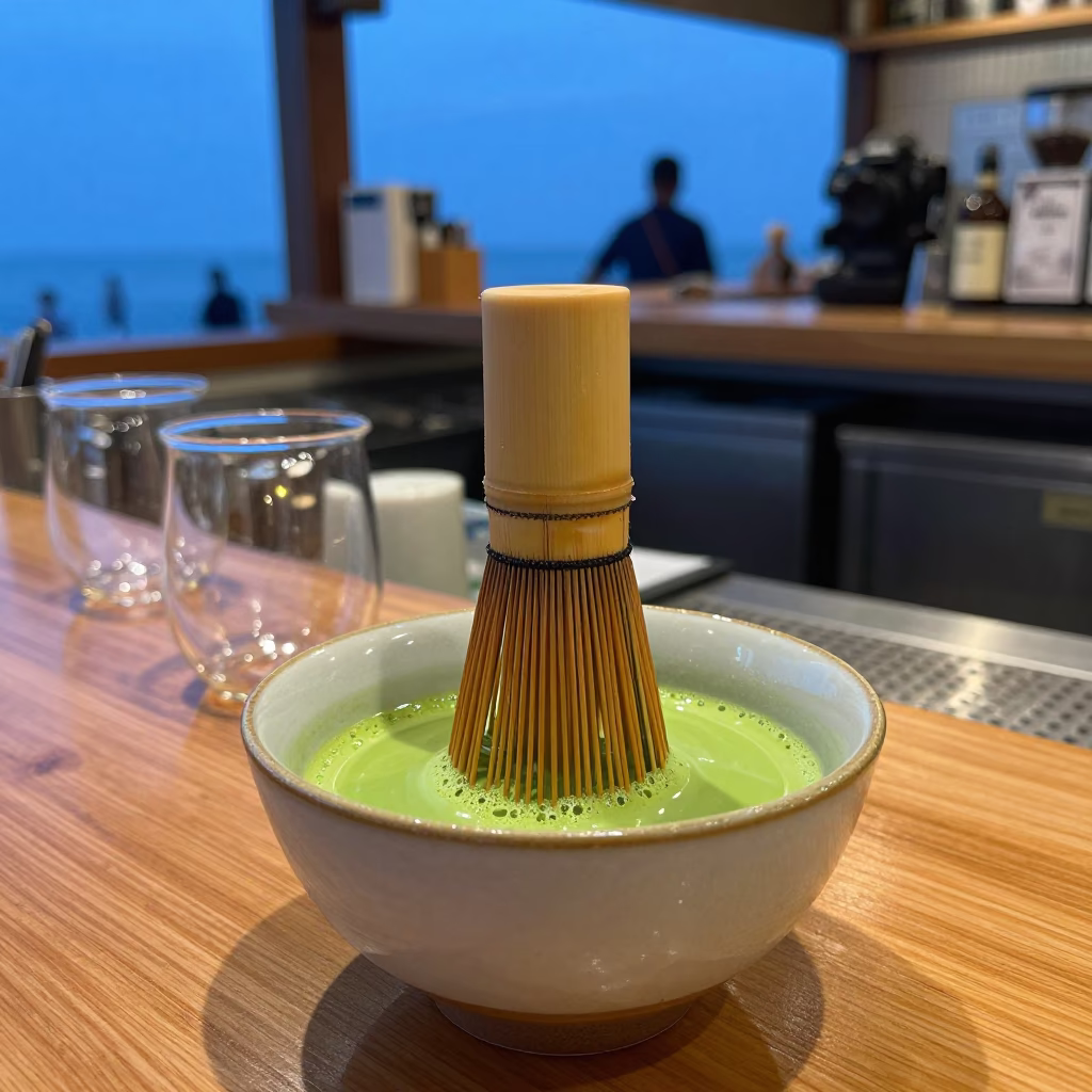 Whisked Matcha Tea at Mumbai Coffee Bar in at a coffee bar counter in Marine Drive, Mumbai