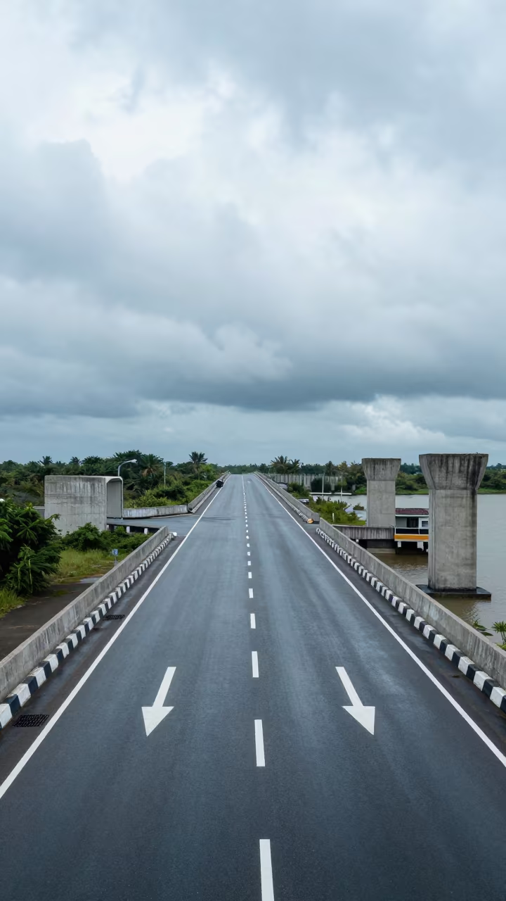 White Arrows on Overpass Storm Barrier Mekong Delta in beside a storm surge barrier in the Mekong Delta