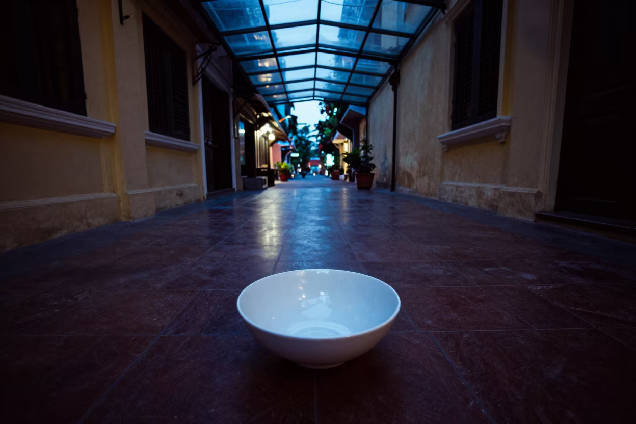 White Bowl and Neon Light in Hanoi Arcade in inside a glass-roofed arcade in French Quarter, Hanoi