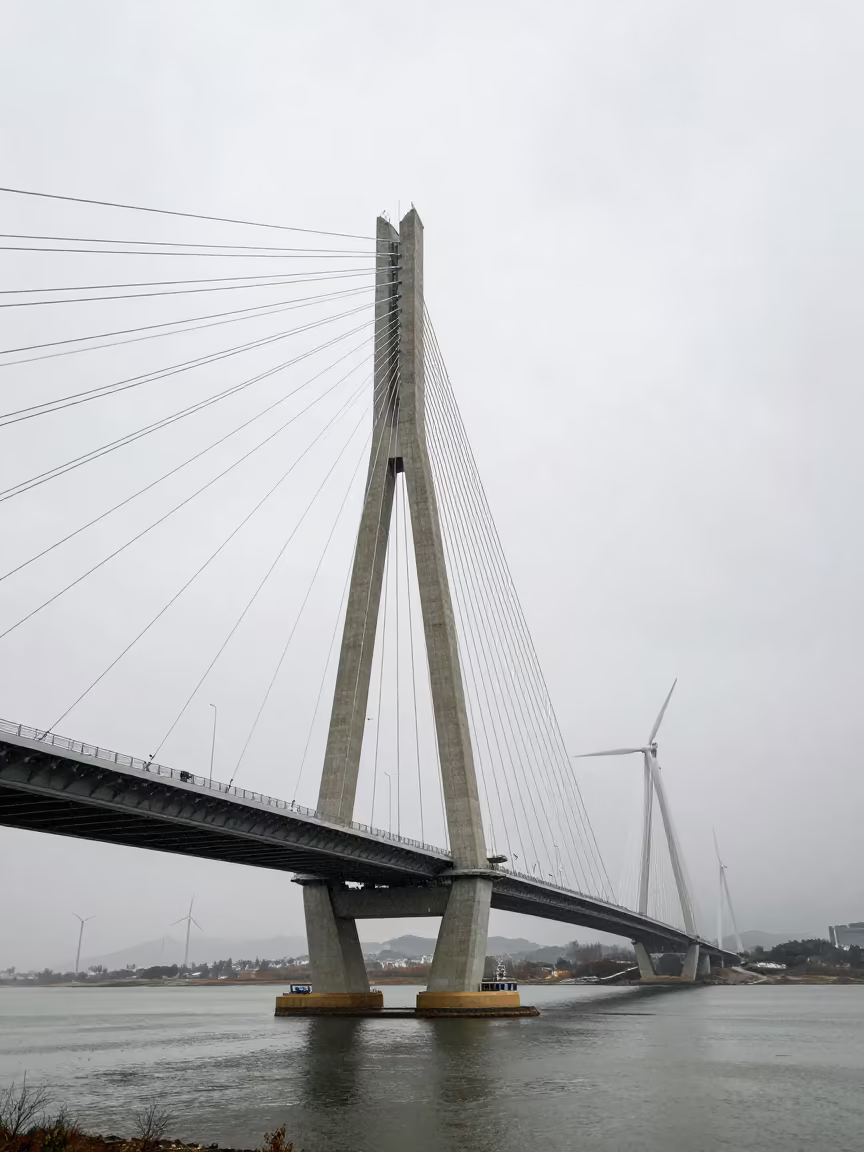 Wind Farm Cabin Under Greek Bridge in Sleet in under a cable-stayed bridge span in Greece