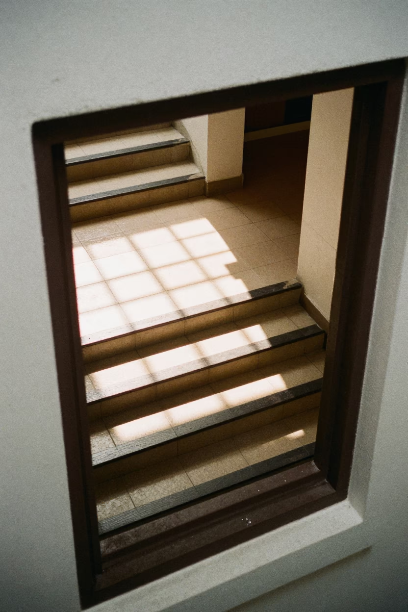 Window Frame Shadow Squares Tiled Stair Hall Singapore in inside a tiled stair hall in Little India, Singapore
