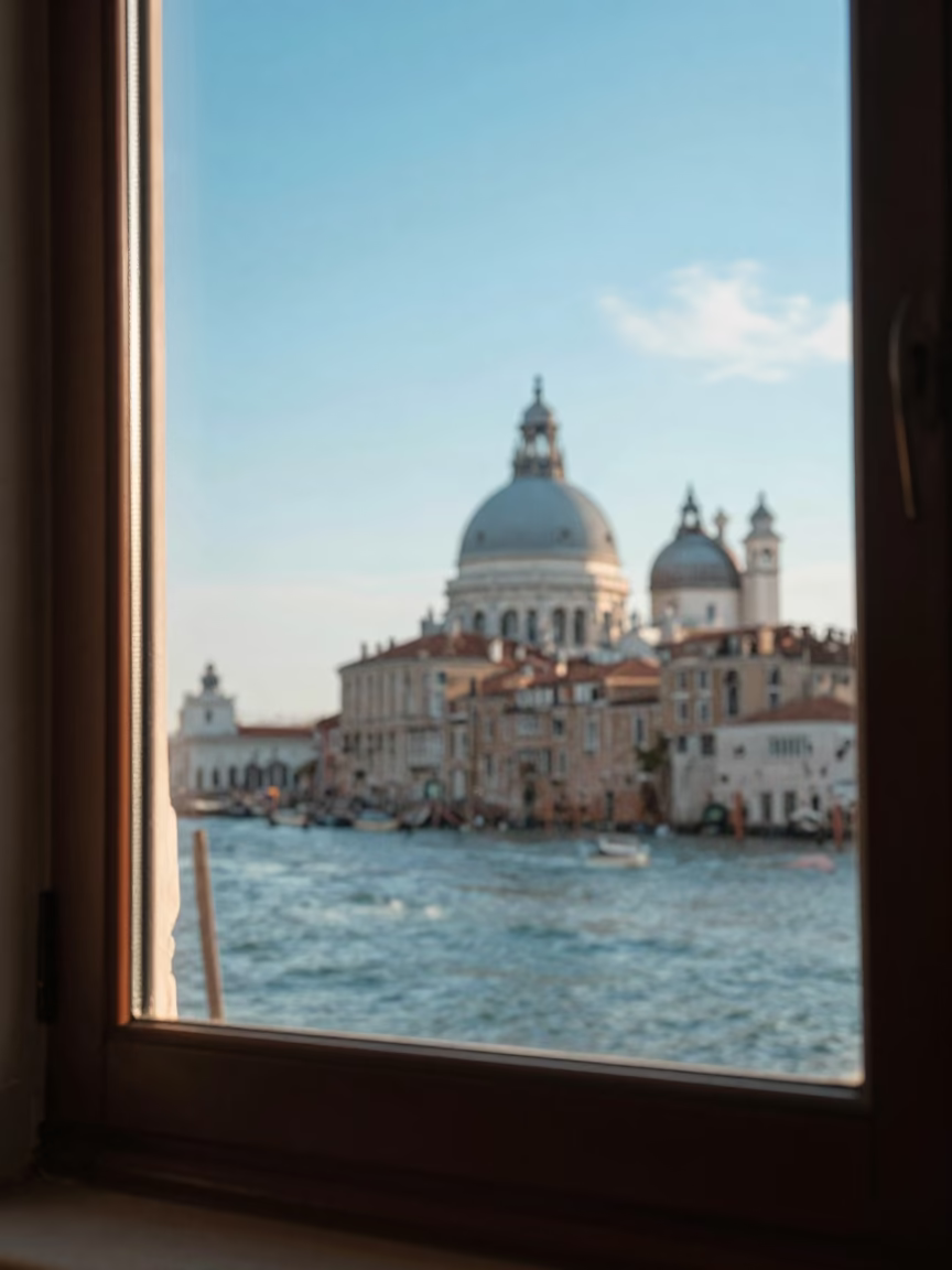 Window View in Venice at Clear Late-afternoon Light in in Venice, Italy