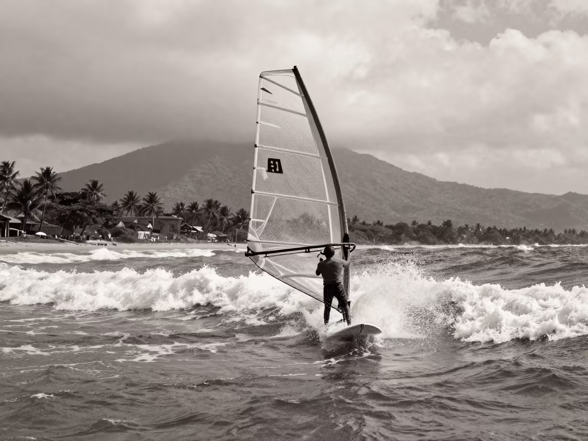 Windsurfer Launching Off Choppy Wave in Monsoon Afternoon in on a mountain path near Daura