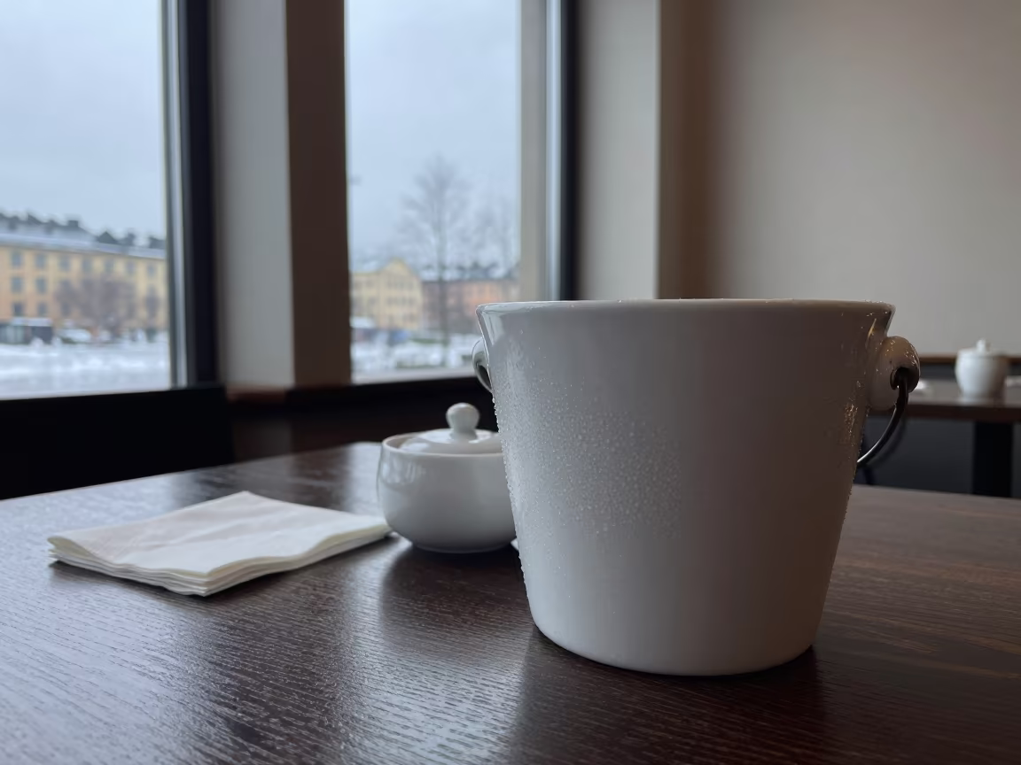 Winter Cafe Ice Bucket Window Light in on a cafe table by a window near Stockholm