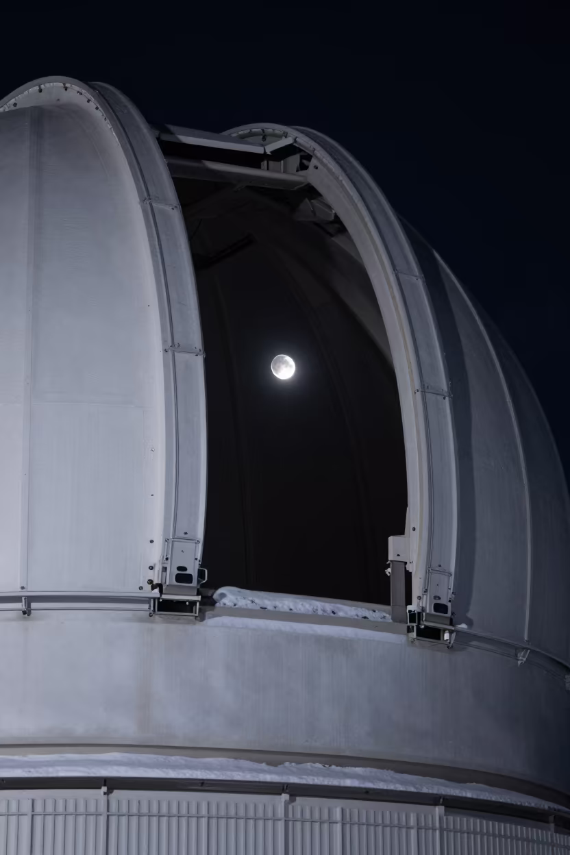 Winter Moon Through Observatory Dome Slit in beside an observatory dome in New York