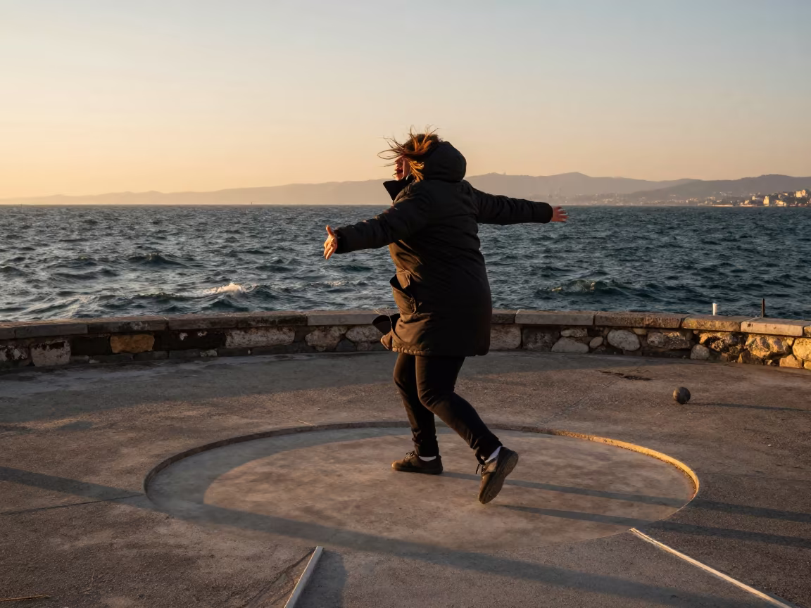 Winter Sunset Shot Putter at Istanbul Harbor in at a harbor edge in Istanbul