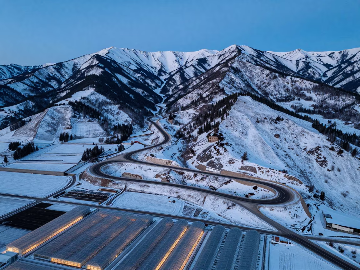 Winter Switchback Road Over Alberta Greenhouse Grids in high over greenhouse grids in Alberta