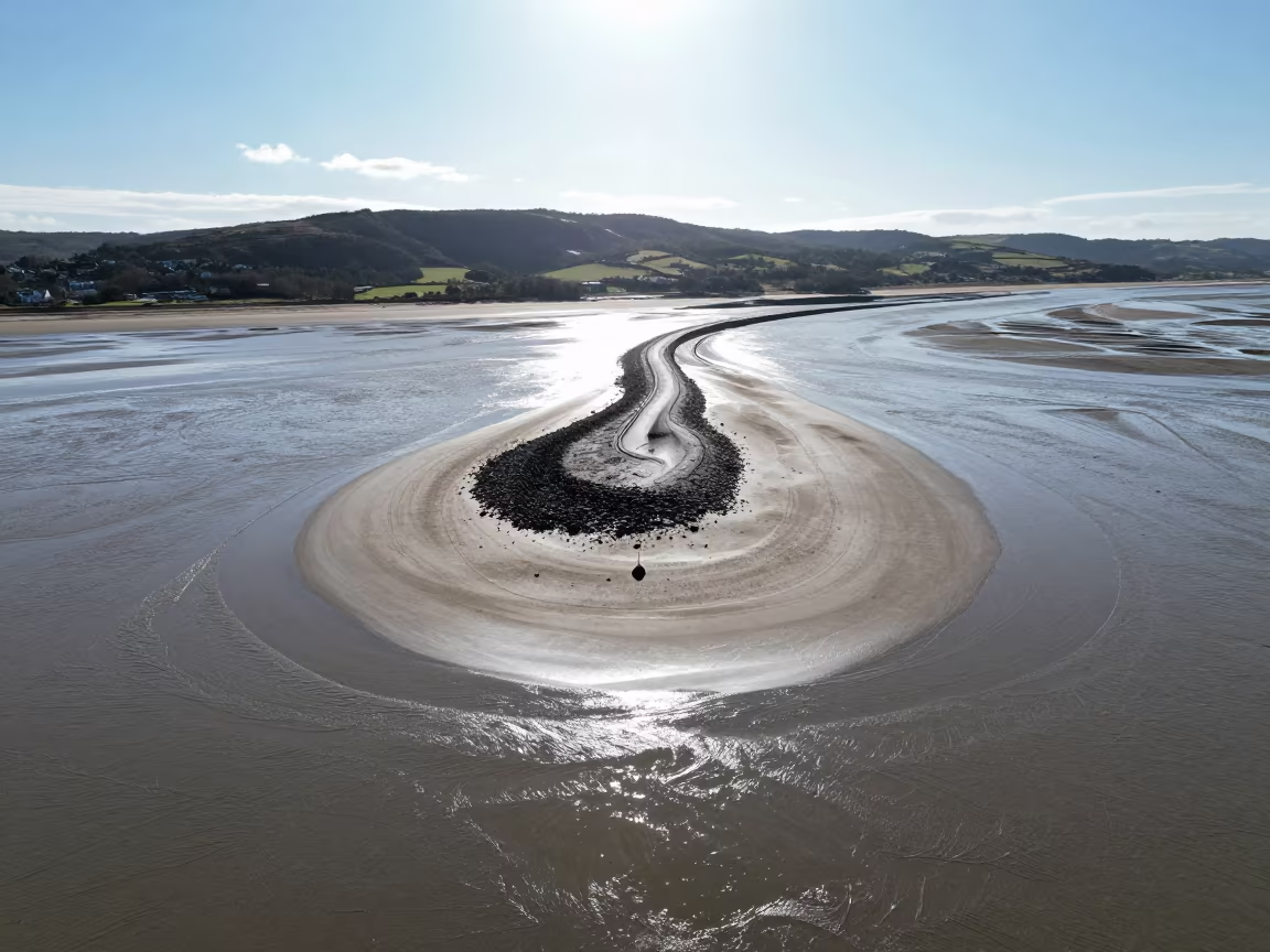 Winter Tidal Island Causeway Aerial View UK in far above river meanders in United Kingdom