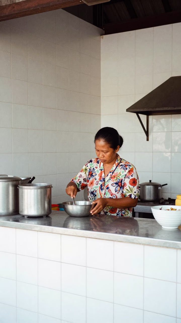 Woman Cooking in Denpasar in in Denpasar, Indonesia