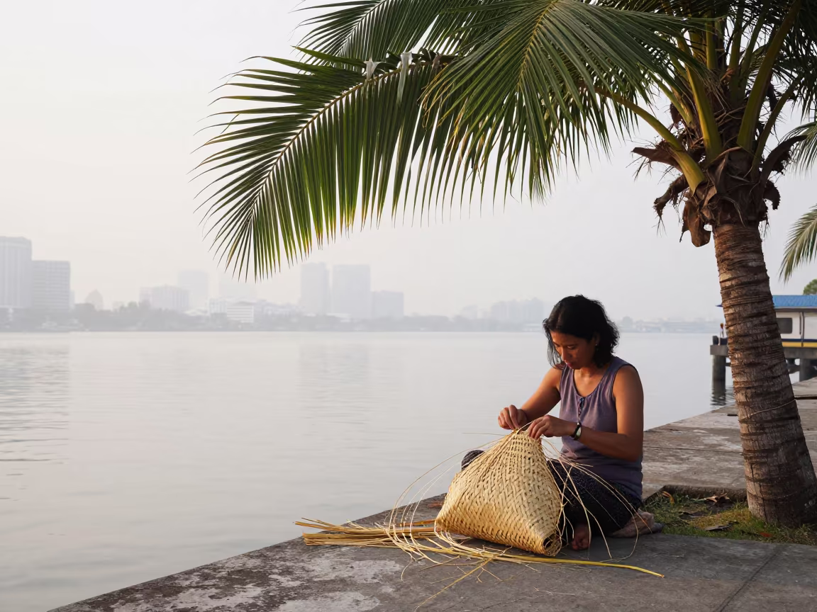 Woman Weaving Palm Basket at Bangkok Harbor Dawn in at a harbor edge in Silom, Bangkok