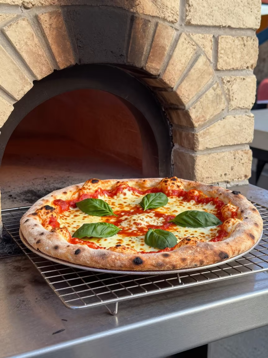 Wood Fired Pizza Fresh from Brick Oven in on a bakery cooling rack in Kitai-gorod, Moscow