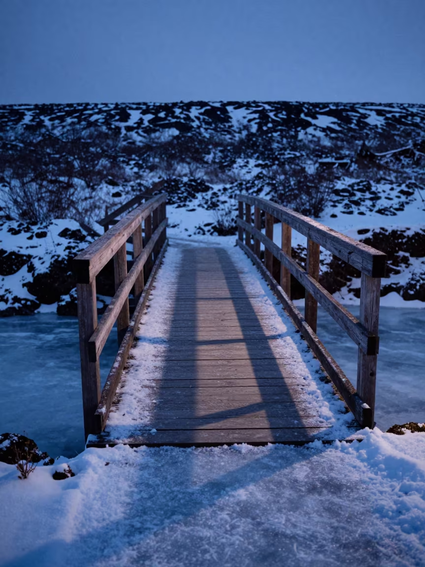 Wooden Bridge Over Frozen Brook in Iceland Evening in in Iceland