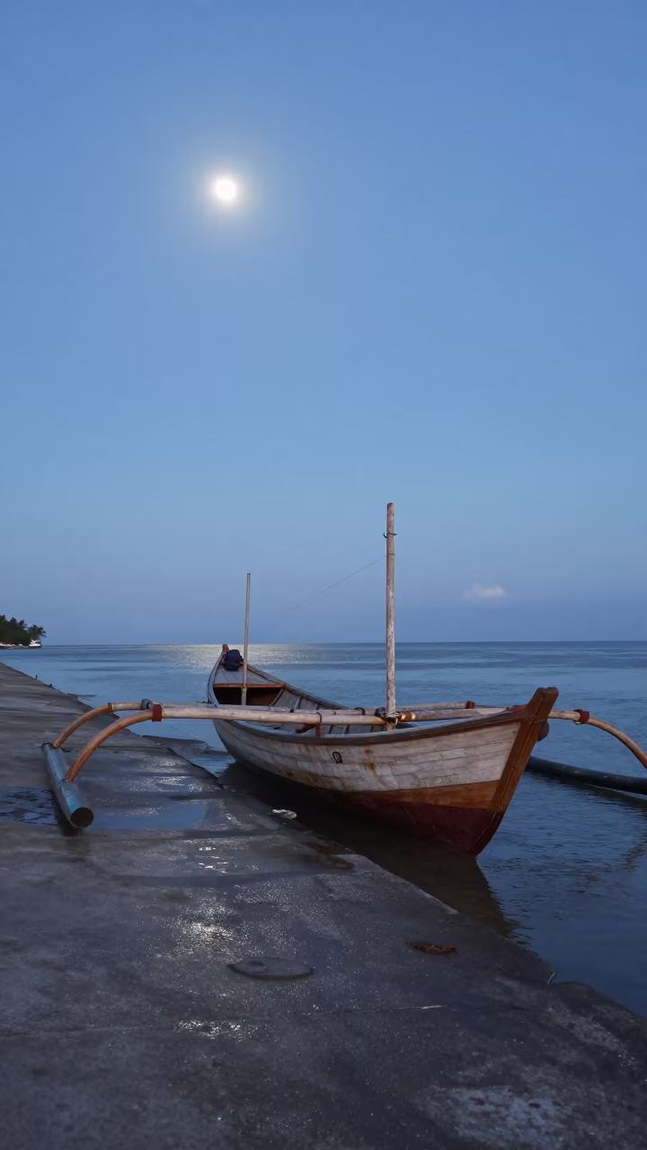 Wooden Outrigger Boat on Bandung Causeway Dawn in on a wind-open causeway near Bandung